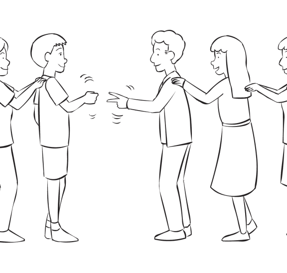 Two lines of people playing a version of Rock Paper Scissors in fun group game called Ro Sham Bo Congo