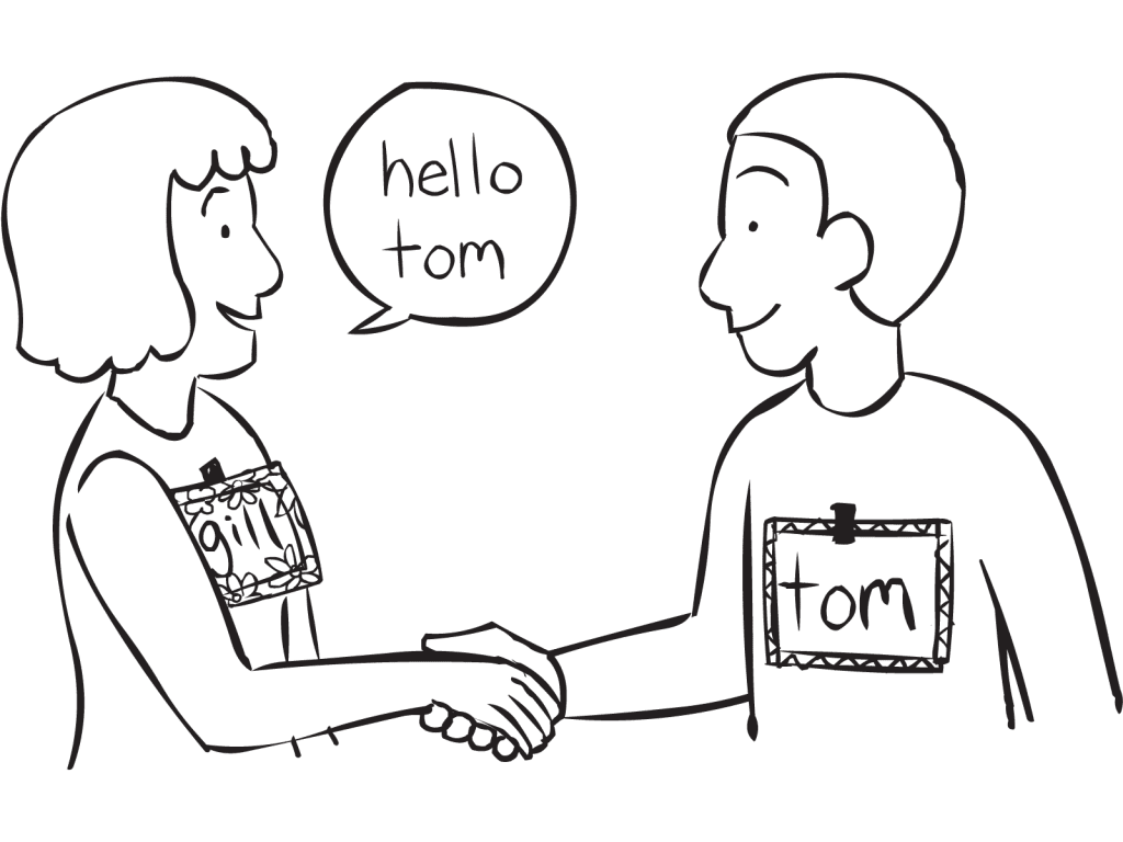 Two people shaking hands in a fun get-to-know-you Name-Tag game