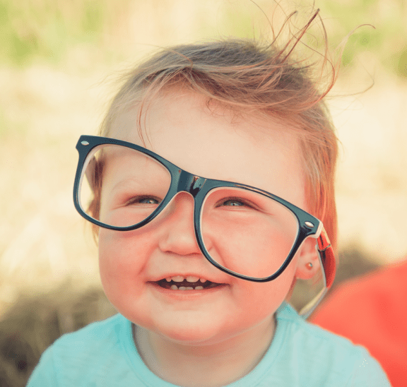 Baby with glasses sharing four leadership lessons. Credit Andriyko Podilnyk