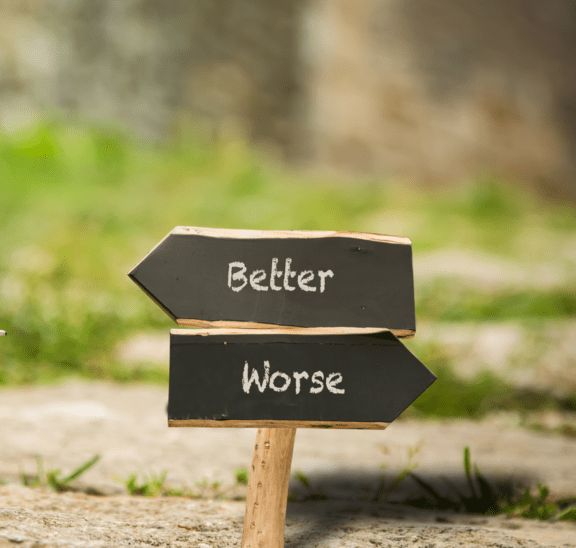 Better off or worse off sign posts shutterstock_1891460809