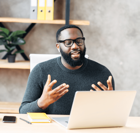 Man presenting webinar to improve online delivery