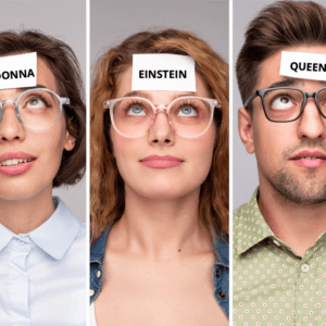 Three people playing Celebrity Heads game kit