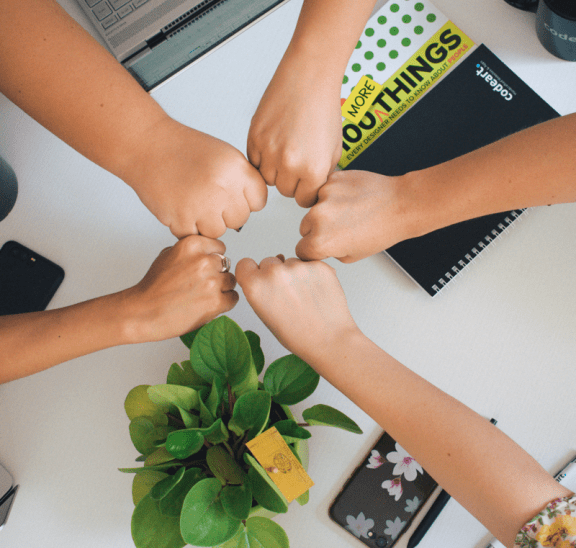 Fist-bumping colleagues reflecting on generativity. Credit Antonio Janeski