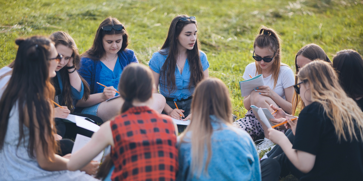 Group of women playing teambuilding activities for students shutterstock_2182798911