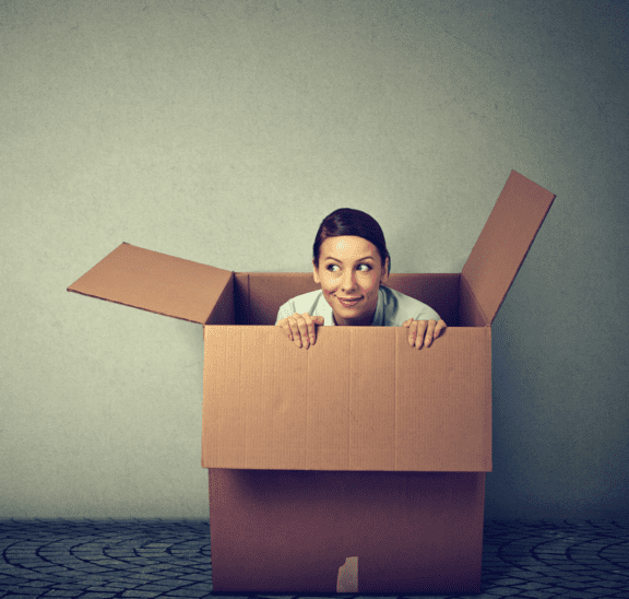 Introverts like this woman peering out of a box