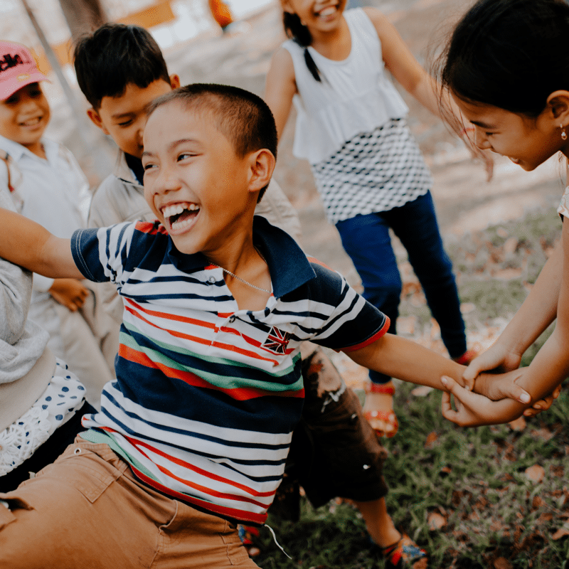 Kids playing with meaning of FUNN. Photo credit: Mi Pham