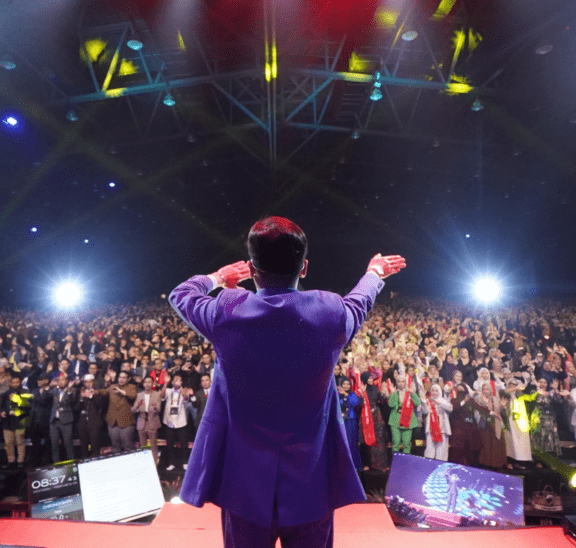 Man leading energiser for large group