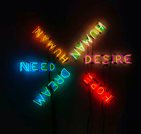 Neon sign with four emotional needs. Credit Stephan Valentin