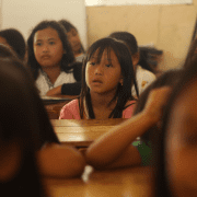 Student looking on at back to school team-building games. Credit Yusril Permana