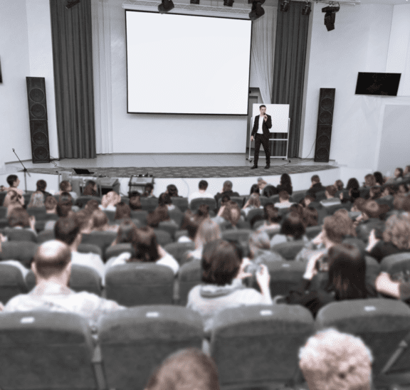 Speaking to large groups seated in tight space