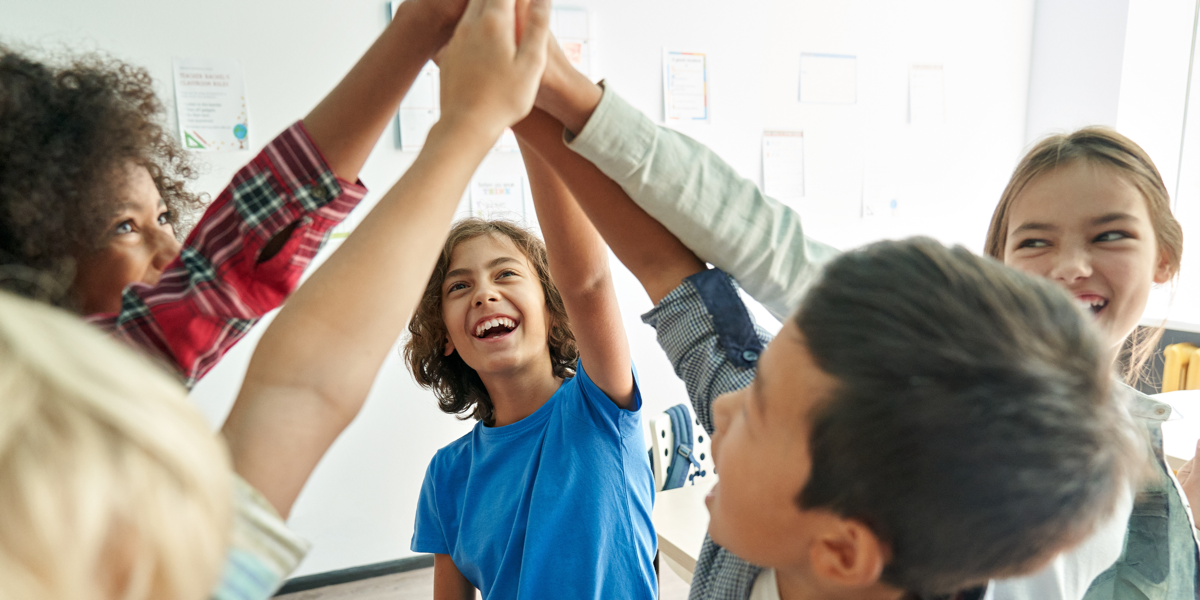 Teens playing one of the best teambuilding activities for teens