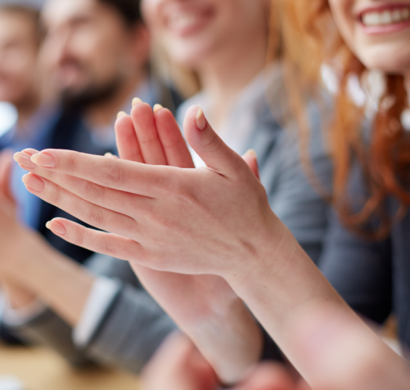 Leaving group on a high with woman clapping